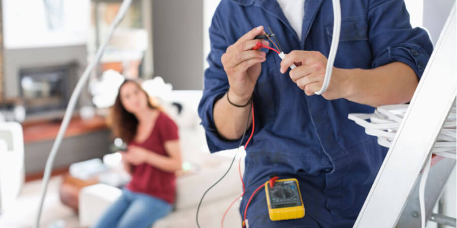 Electrician working in home